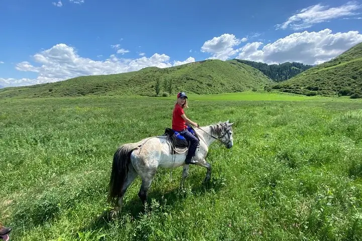 Riding horses in Chon Kemin